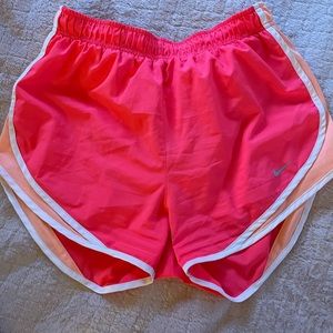 Pink and orange Nike shorts